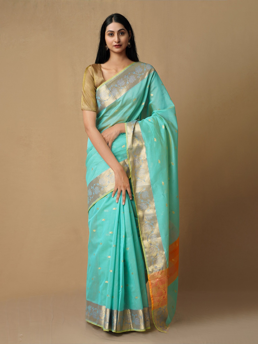 

Unnati Silks Green & Orange Woven Design Zari Silk Cotton Baluchari Saree