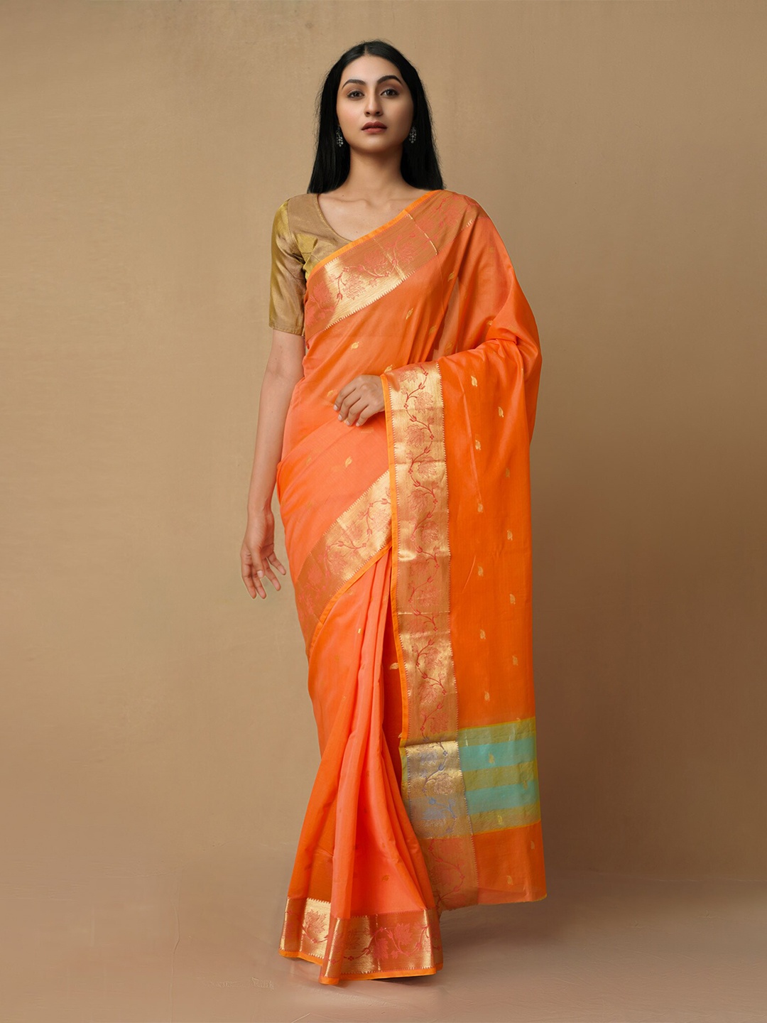 

Unnati Silks Orange & Green Woven Design Zari Silk Cotton Baluchari Saree