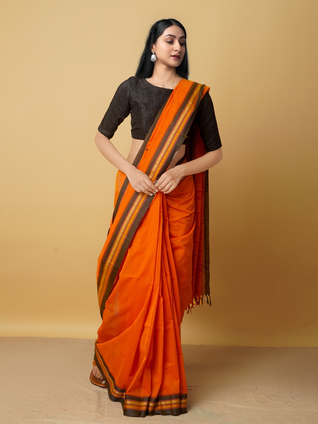 

Unnati Silks Orange & Black Woven Design Pure Cotton Kanjeevaram Saree