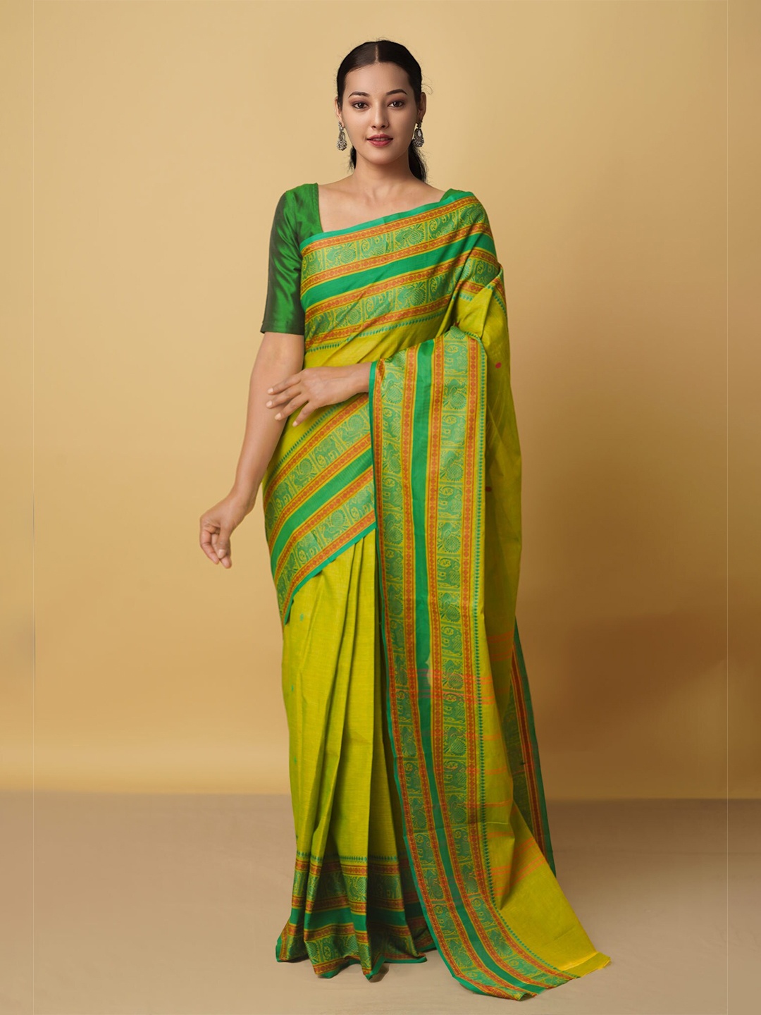 

Unnati Silks Green & Orange Striped Pure Cotton Kanjeevaram Saree