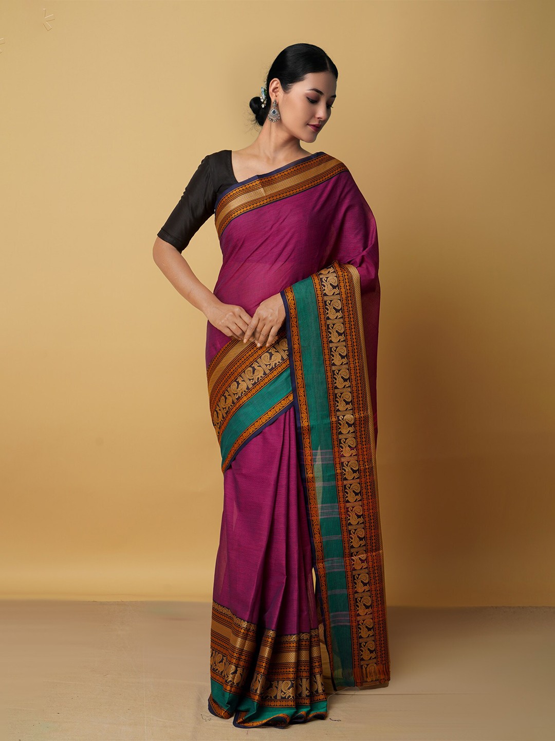 

Unnati Silks Purple & Orange Ethnic Motifs Pure Cotton Kanjeevaram Saree