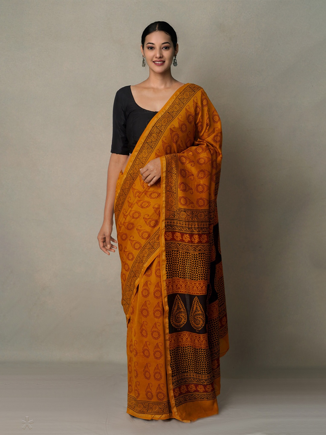 

Unnati Silks Orange & Black Ethnic Motifs Pure Cotton Chanderi Saree