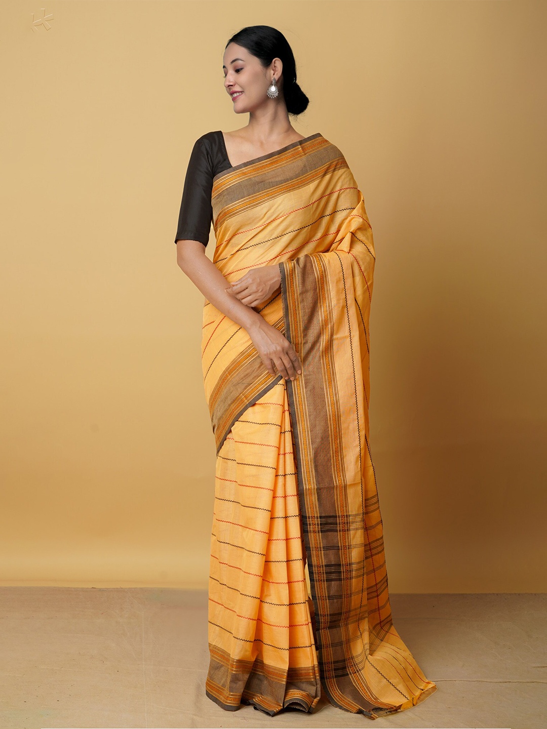 

Unnati Silks Orange & Black Woven Design Pure Cotton Kanjeevaram Saree