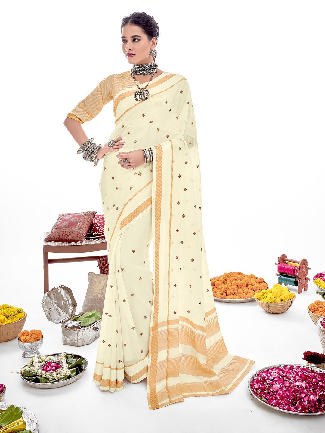 

Shaily Cream-Coloured & Gold-Toned Floral Zari Silk Cotton Saree