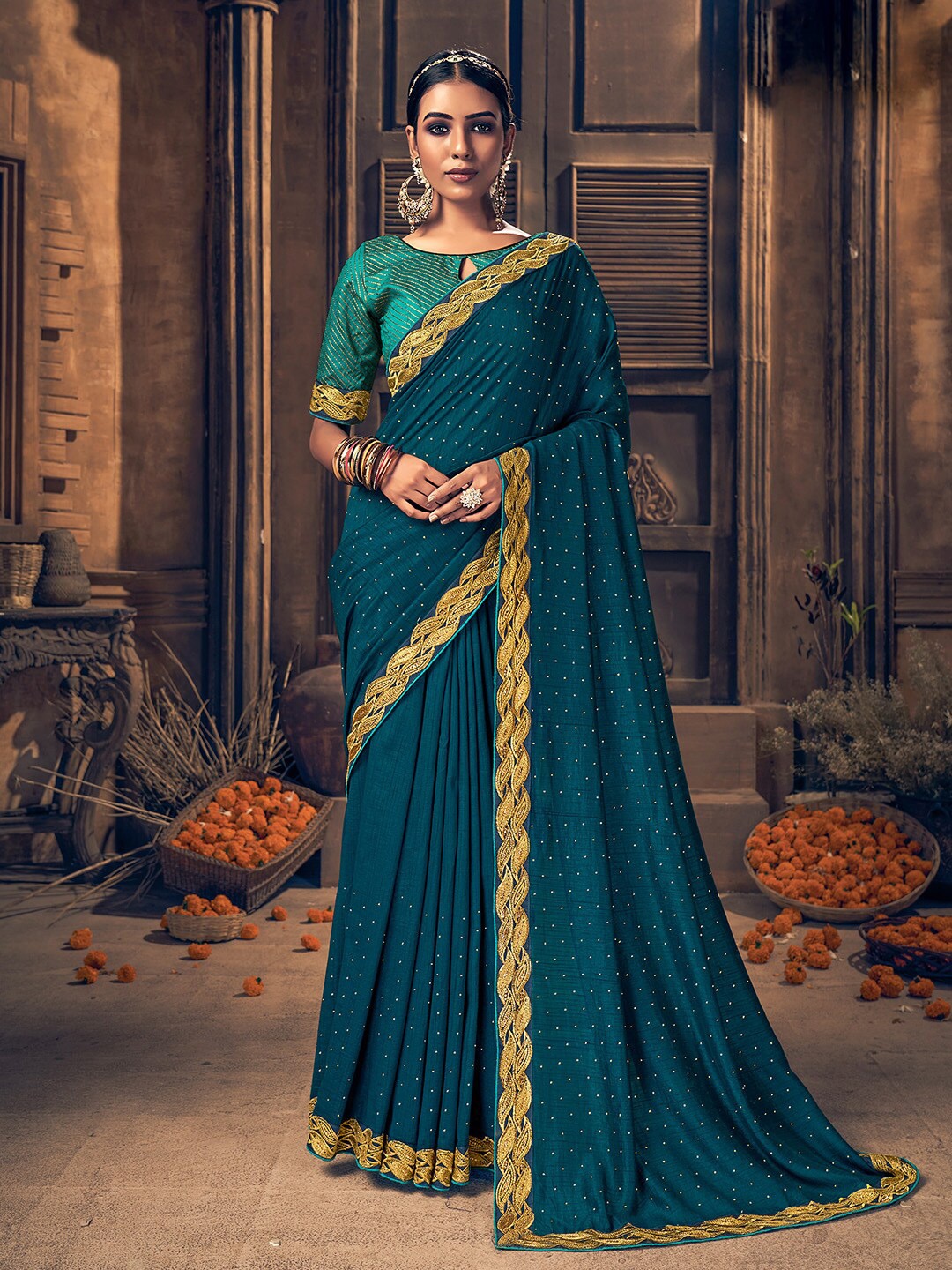 

Shaily Teal & Gold-Toned Embellished Mukaish Saree