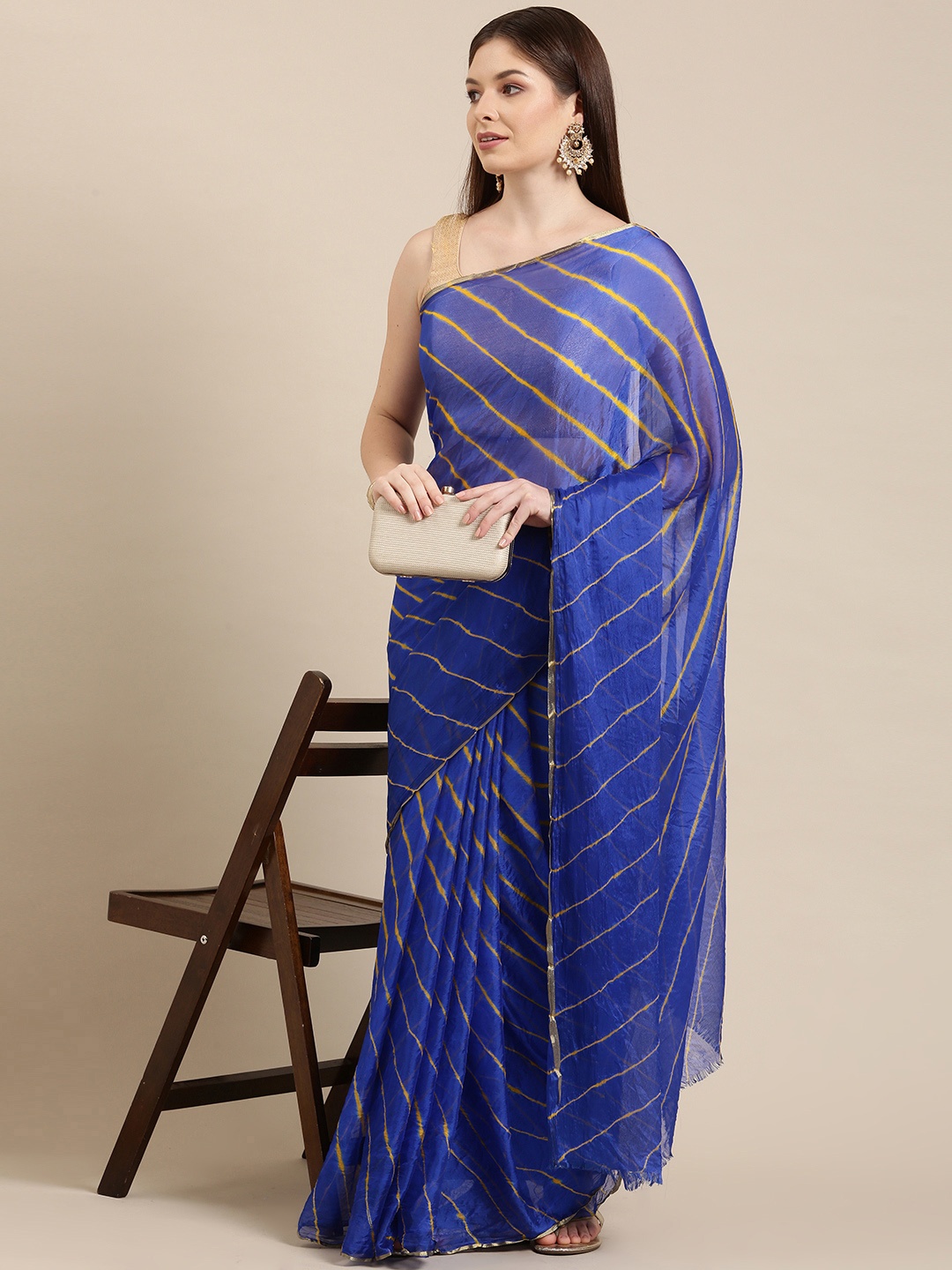 

Pavechas Blue & Gold-Toned Leheriya Zari Art Silk Leheriya Saree