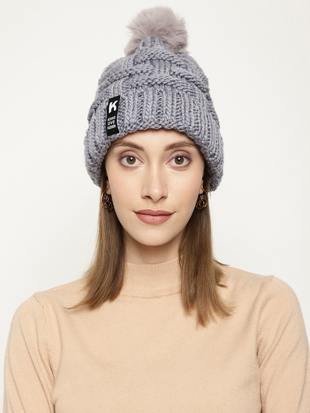 

Roadster Women Grey Self-Design Winter Woolen Beanie