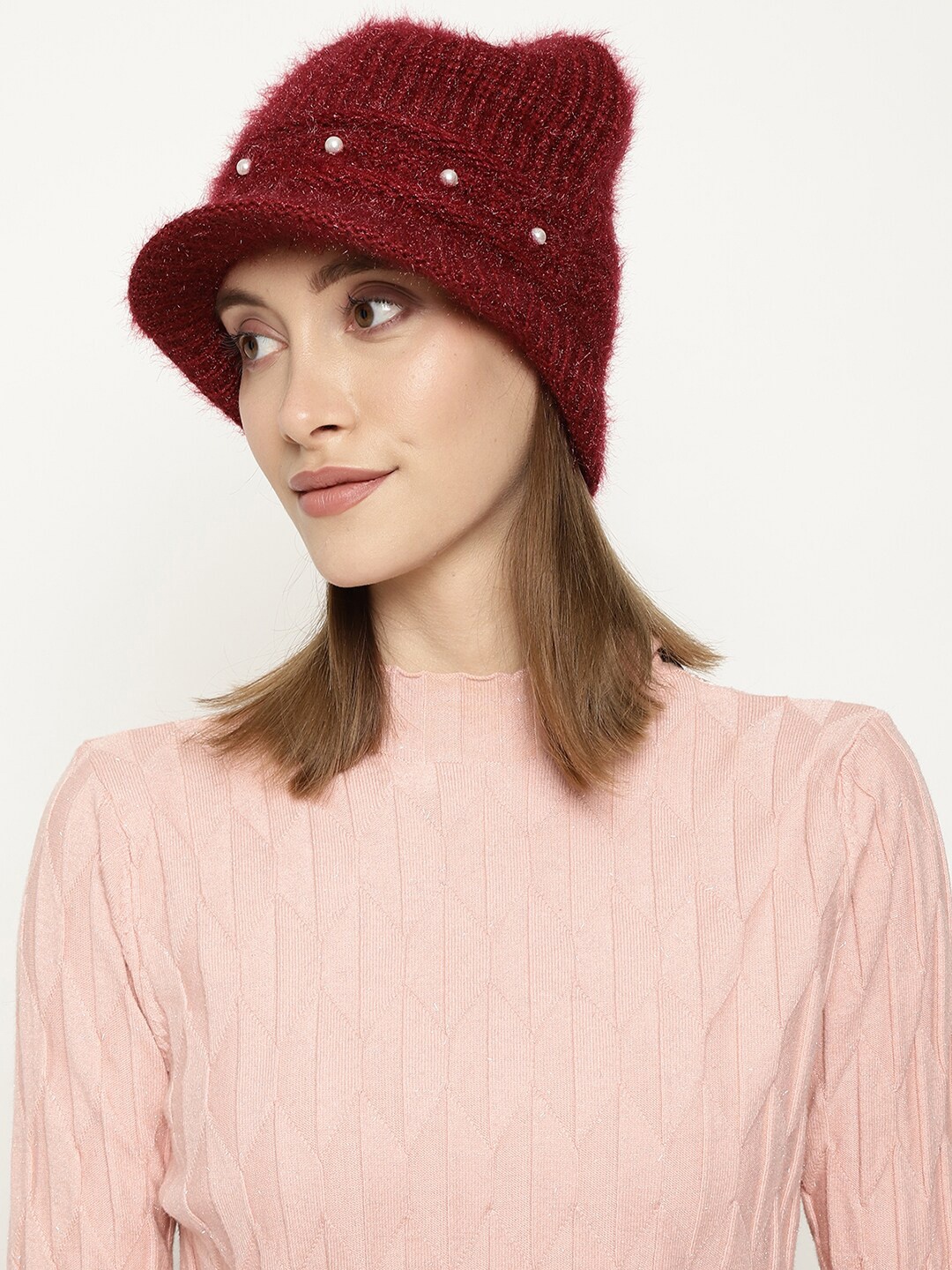 

Roadster Women Red Self-Design Woolen Beanie Visor Cap