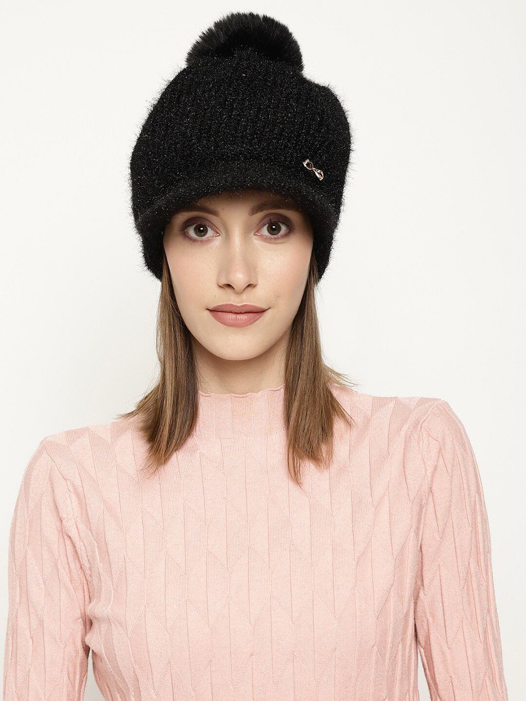 

Roadster Women Black Self-Design Winter Woolen Visor Cap