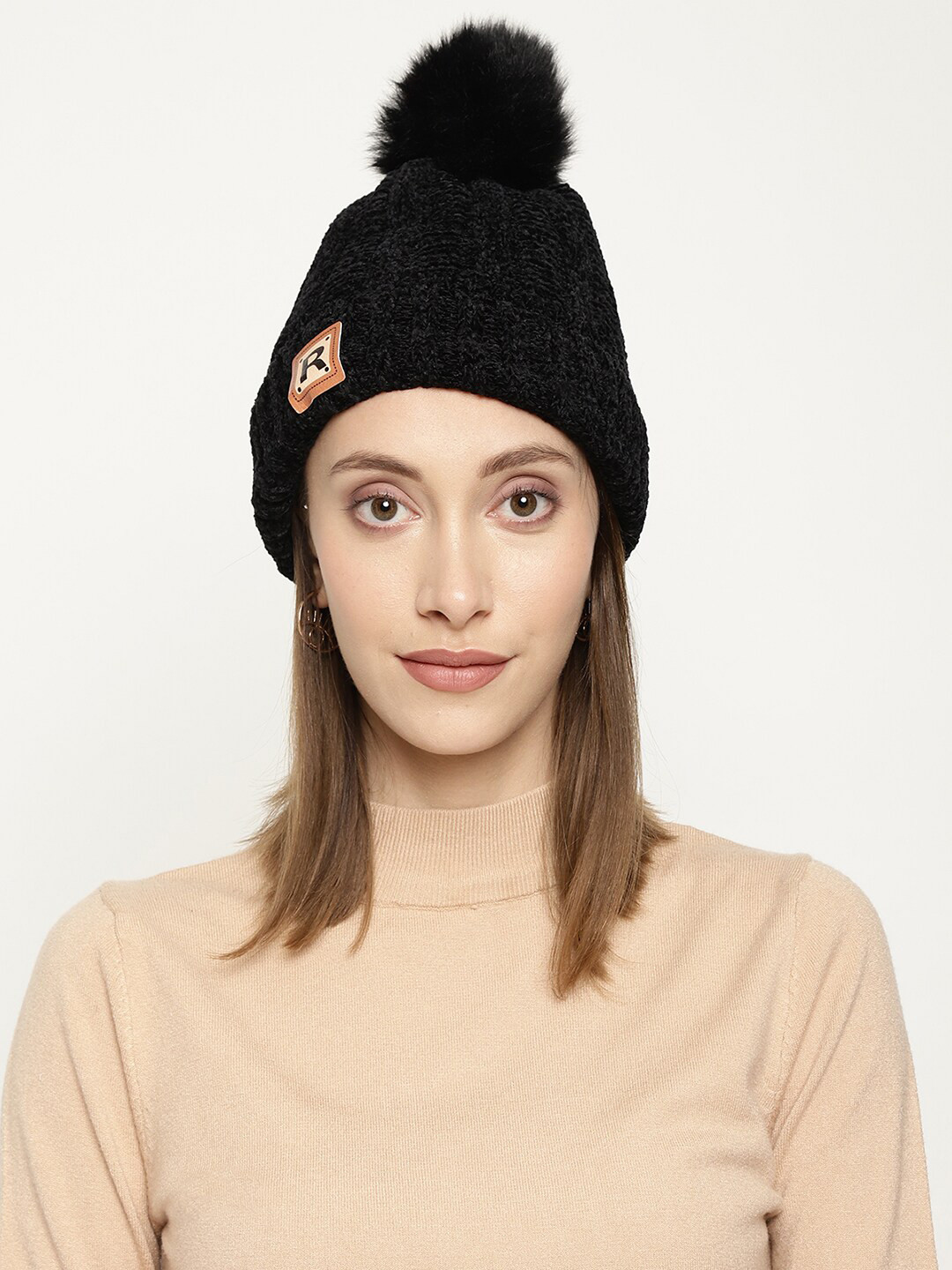 

Roadster Women Black Self-Design Winter Woolen Beanie