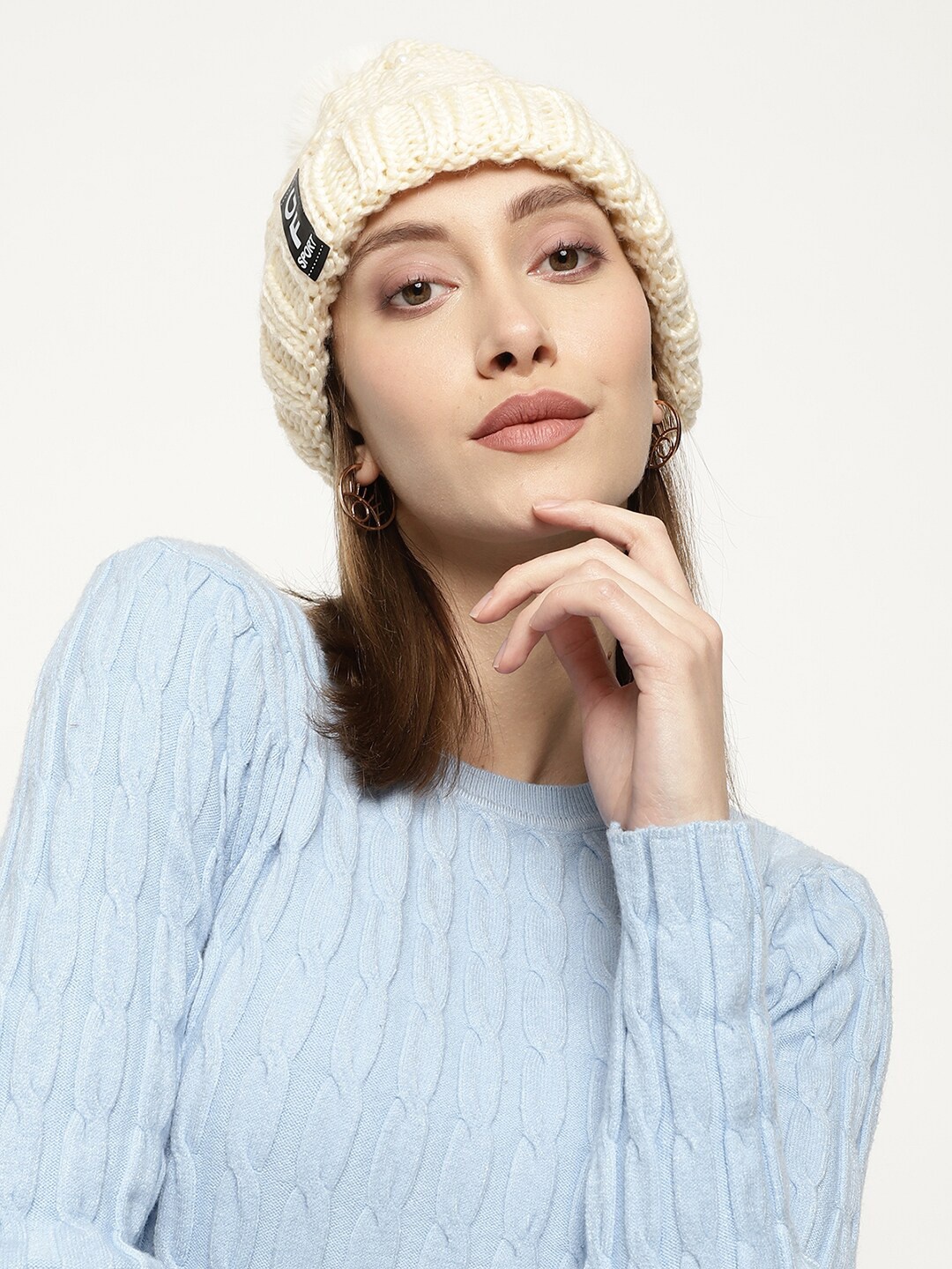 

Roadster Women Off-White Self-Design Winter Woolen Beanie