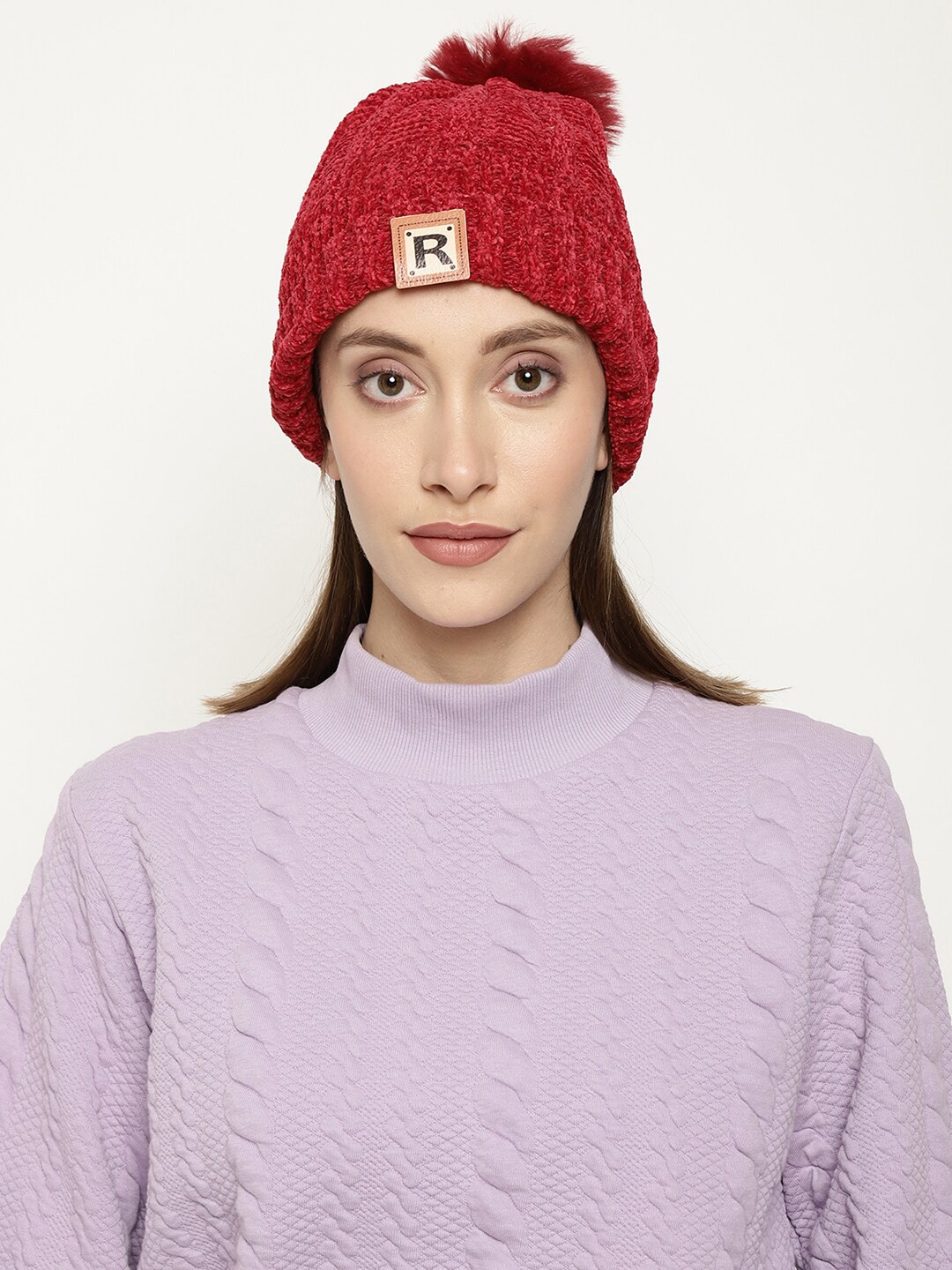

Roadster Women Red Self-Design Woolen Beanie Cap