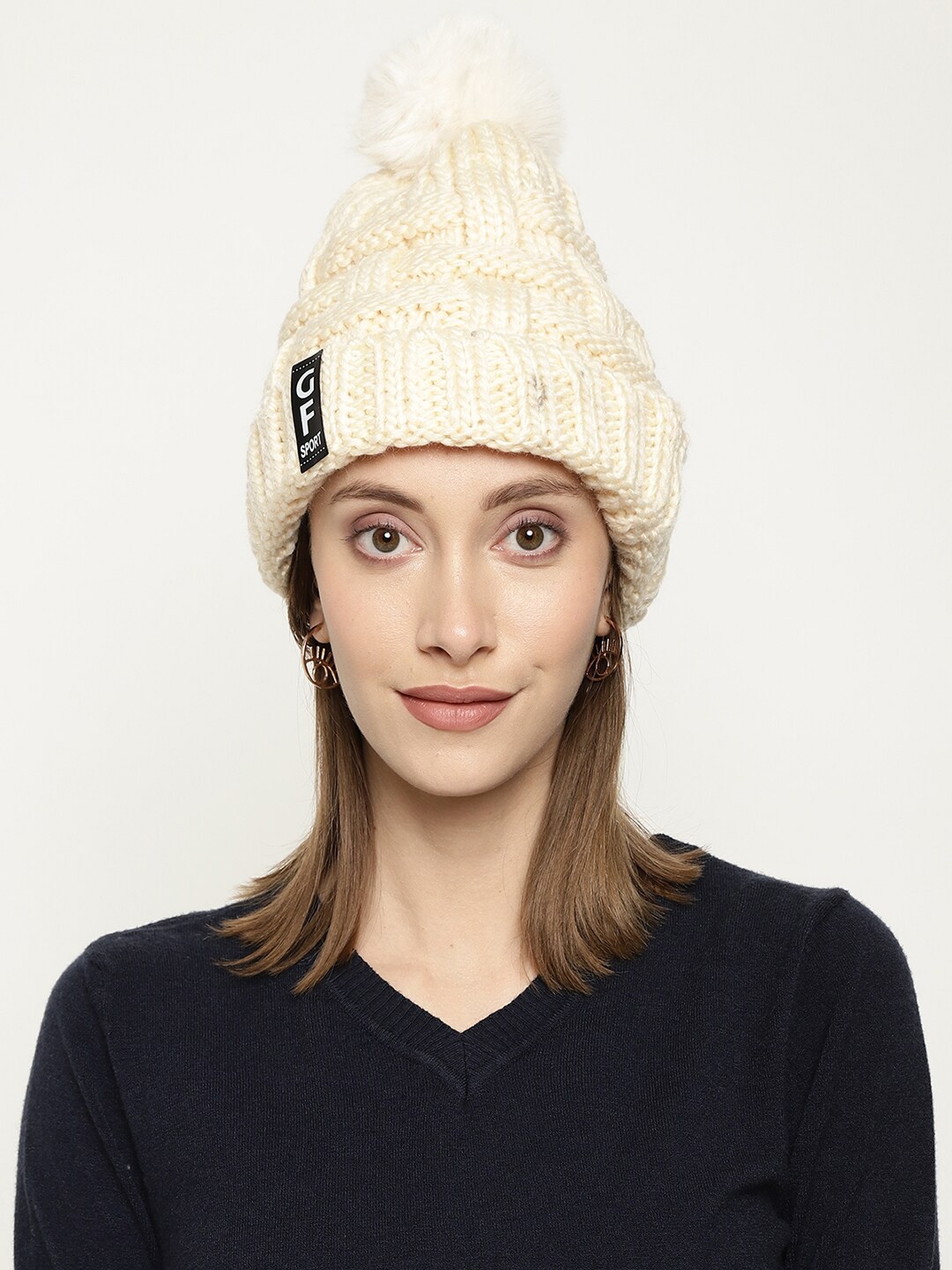 

Roadster Women Cream Colored Self-Design Woolen Beanie Caps