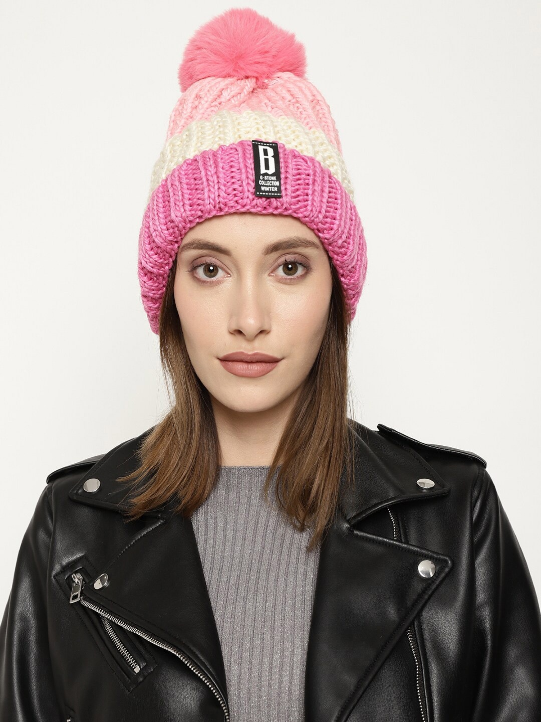 

Roadster Women Pink & Cream Colored Self-Design Woolen Beanie Cap