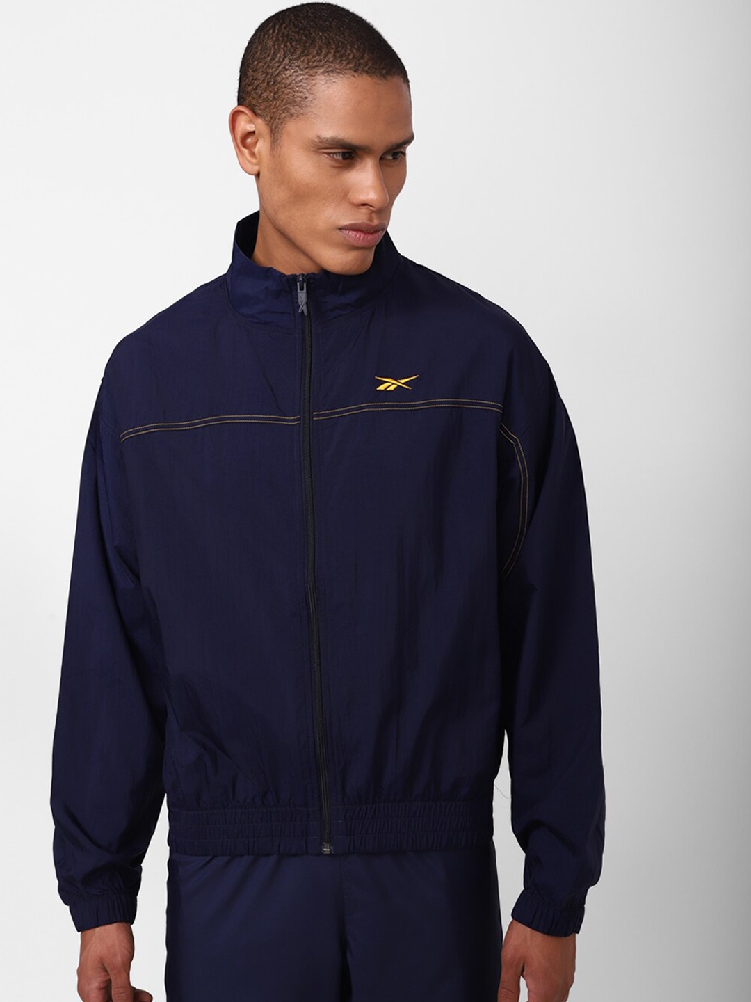 

Reebok Men Solid Bomber Jacket, Navy blue