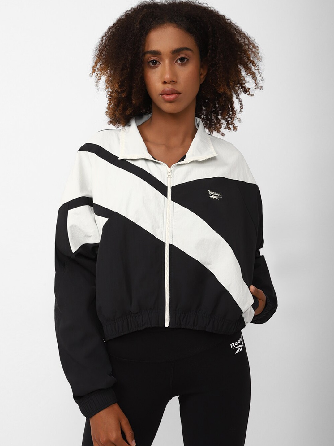 

Reebok Women Solid Colourblocked Sporty Jacket, Black