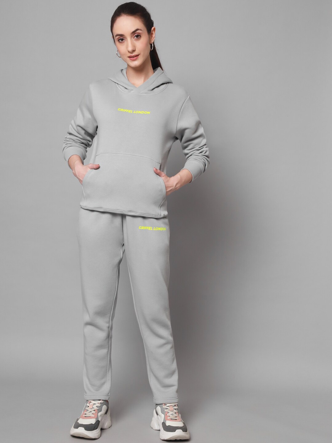 

GRIFFEL Women Solid Hooded Sports Tracksuits, Grey