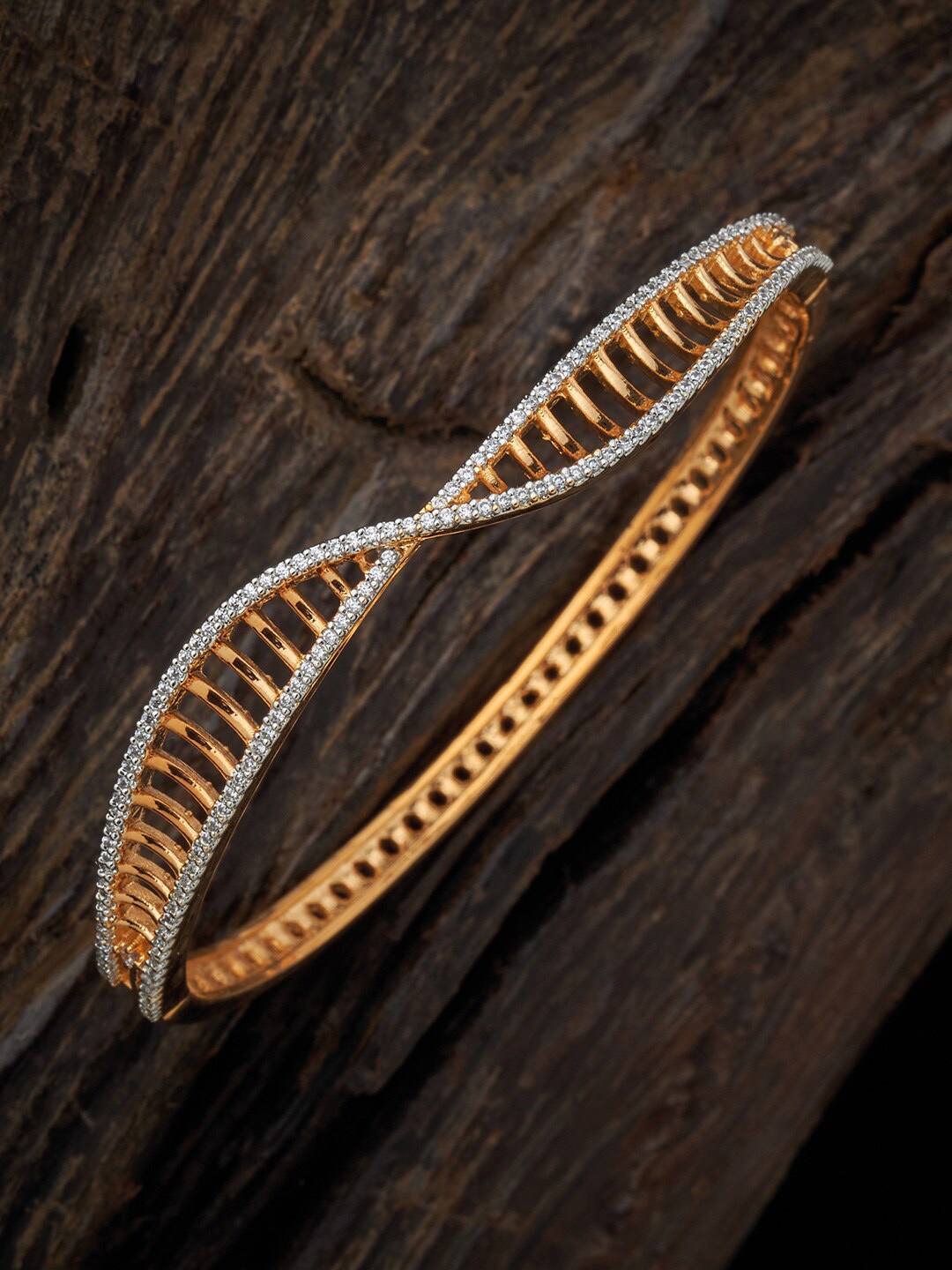 

Kushal's Fashion Jewellery Women Gold-Toned & White Cubic Zirconia Gold-Plated Kada Bracelet