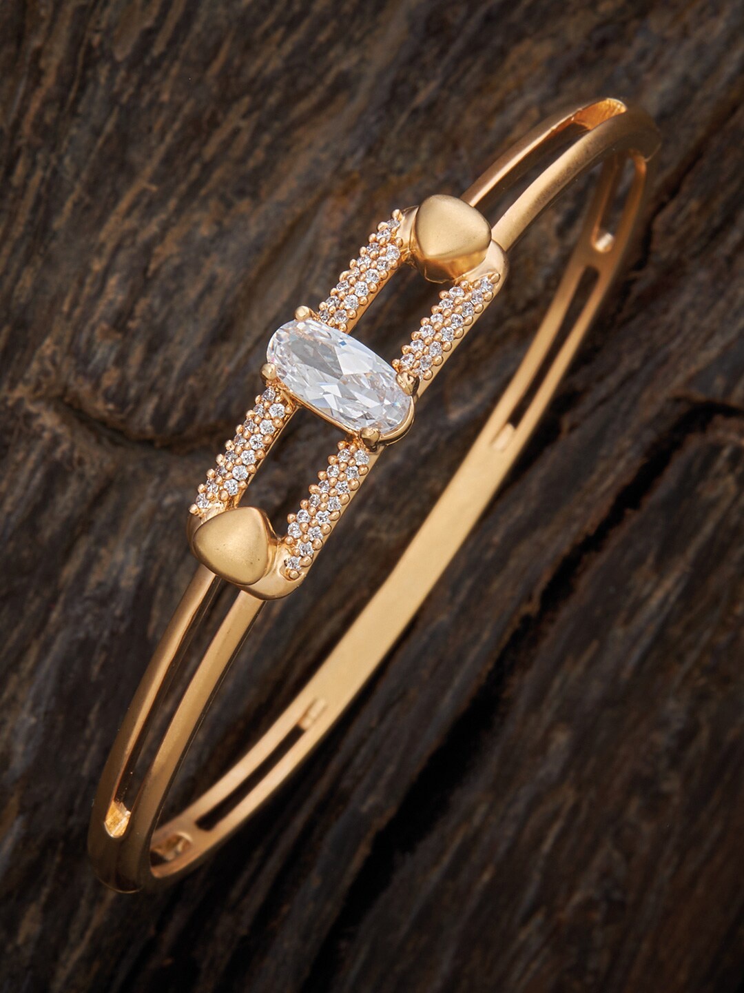 

Kushal's Fashion Jewellery Women Gold-Toned & White Cubic Zirconia Gold-Plated Kada Bracelet