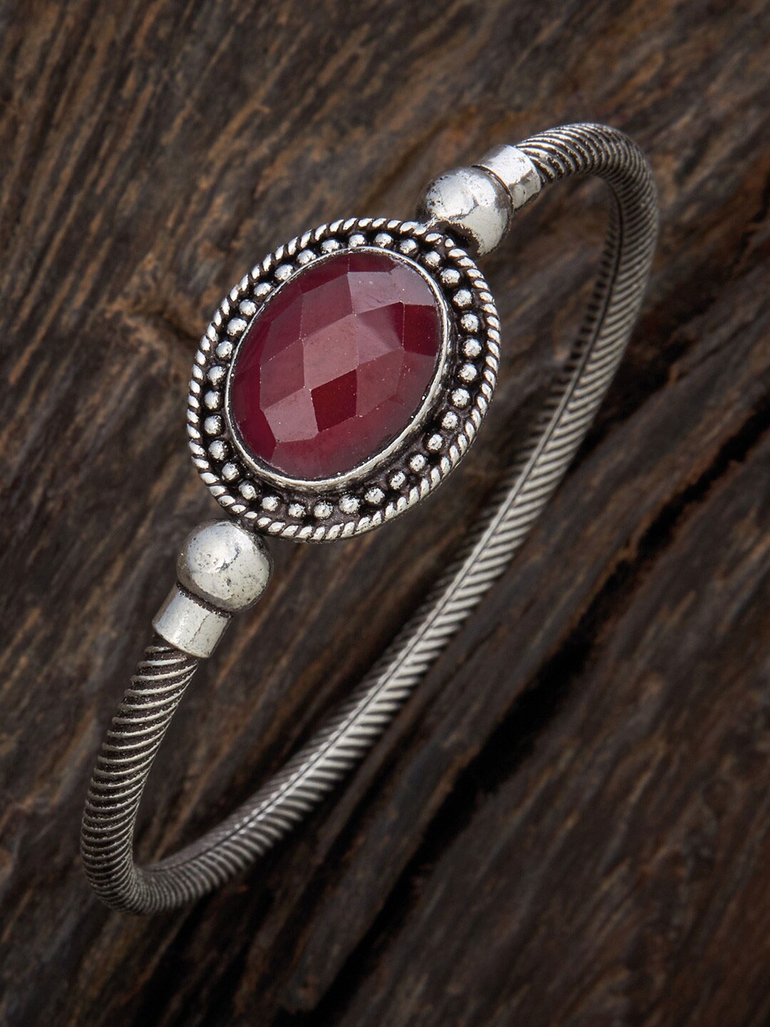 

Kushal's Fashion Jewellery Women Silver-Toned & Red Silver Oxidised Rhodium-Plated Kada Bracelet