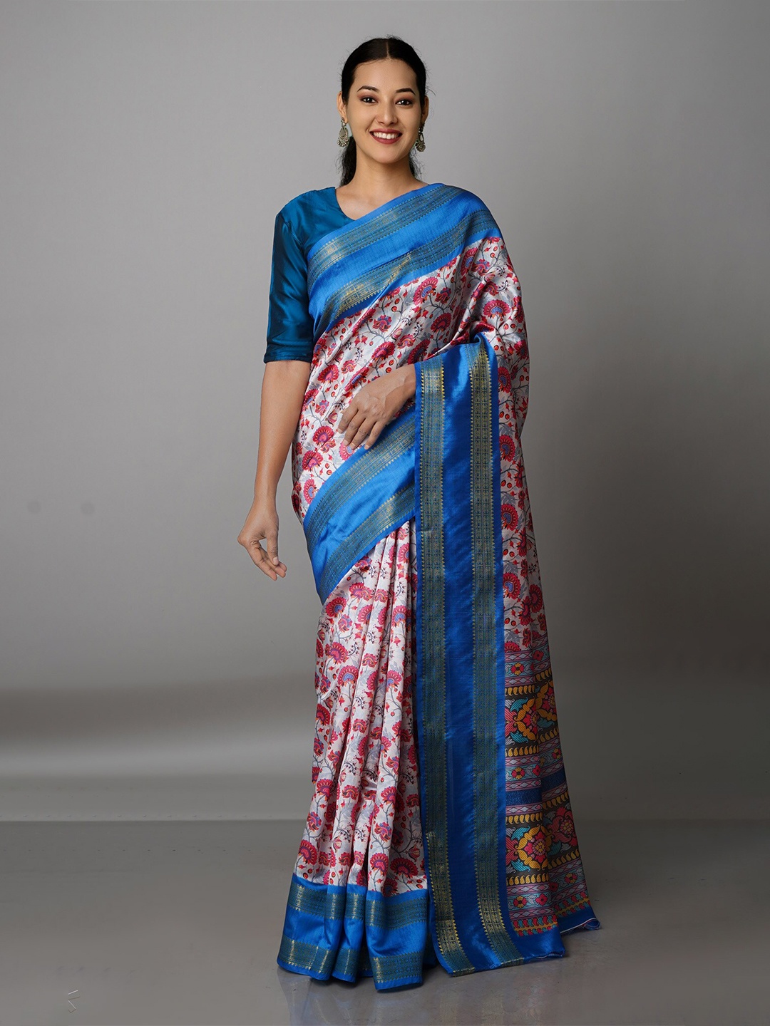 

Unnati Silks Pink & Blue Kalamkari Silk Blend Kanjeevaram Saree