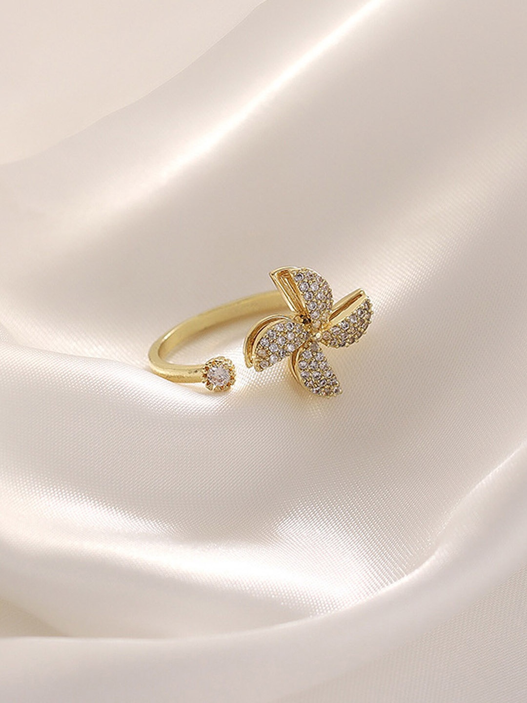 

Vembley Gold-Plated Spinner Cubic Zirconia Studded Adjustable Ring