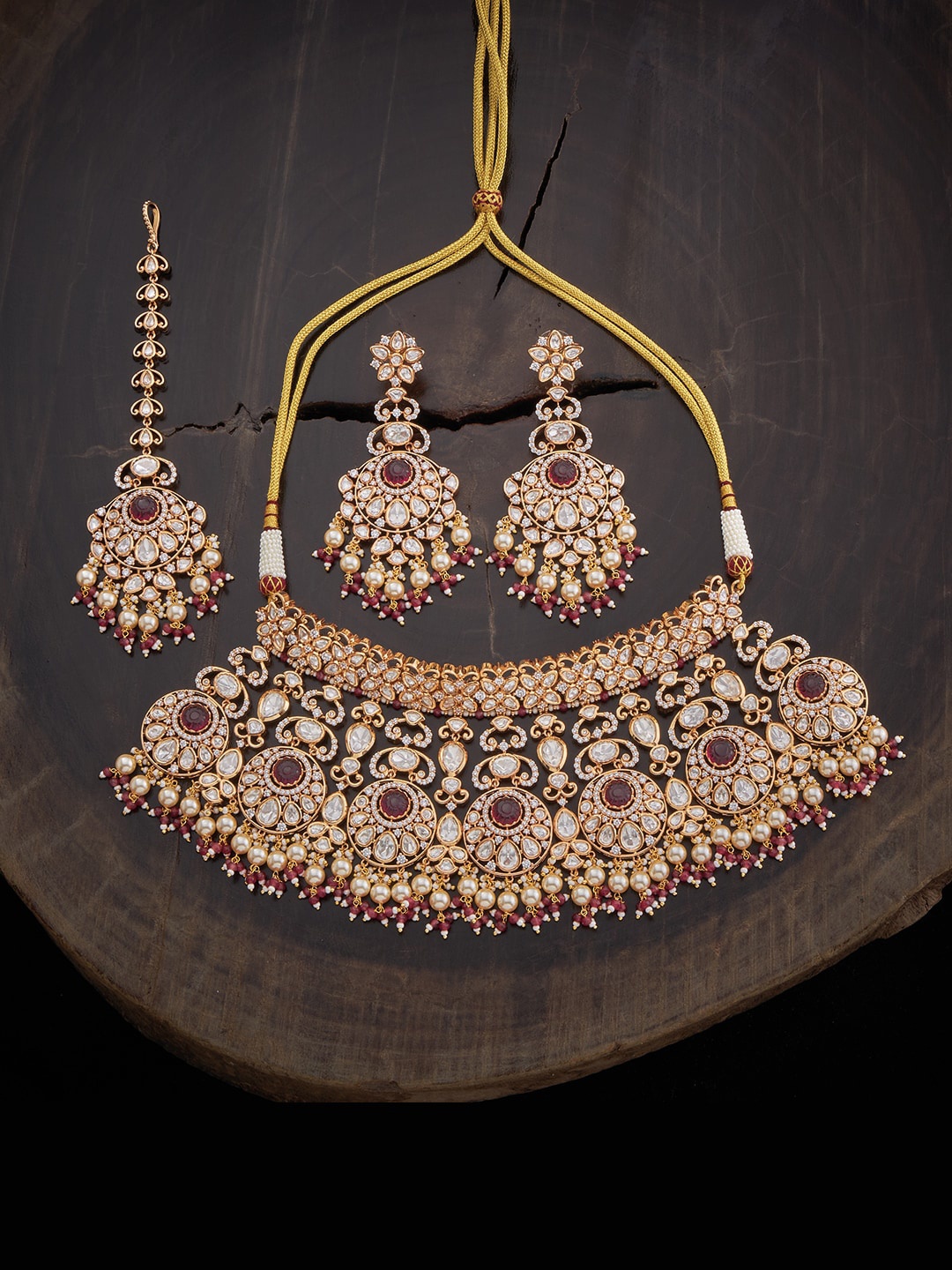 

Kushal's Fashion Jewellery Women Gold Plated Kundan Studded & Beaded Jewellery Set, Red