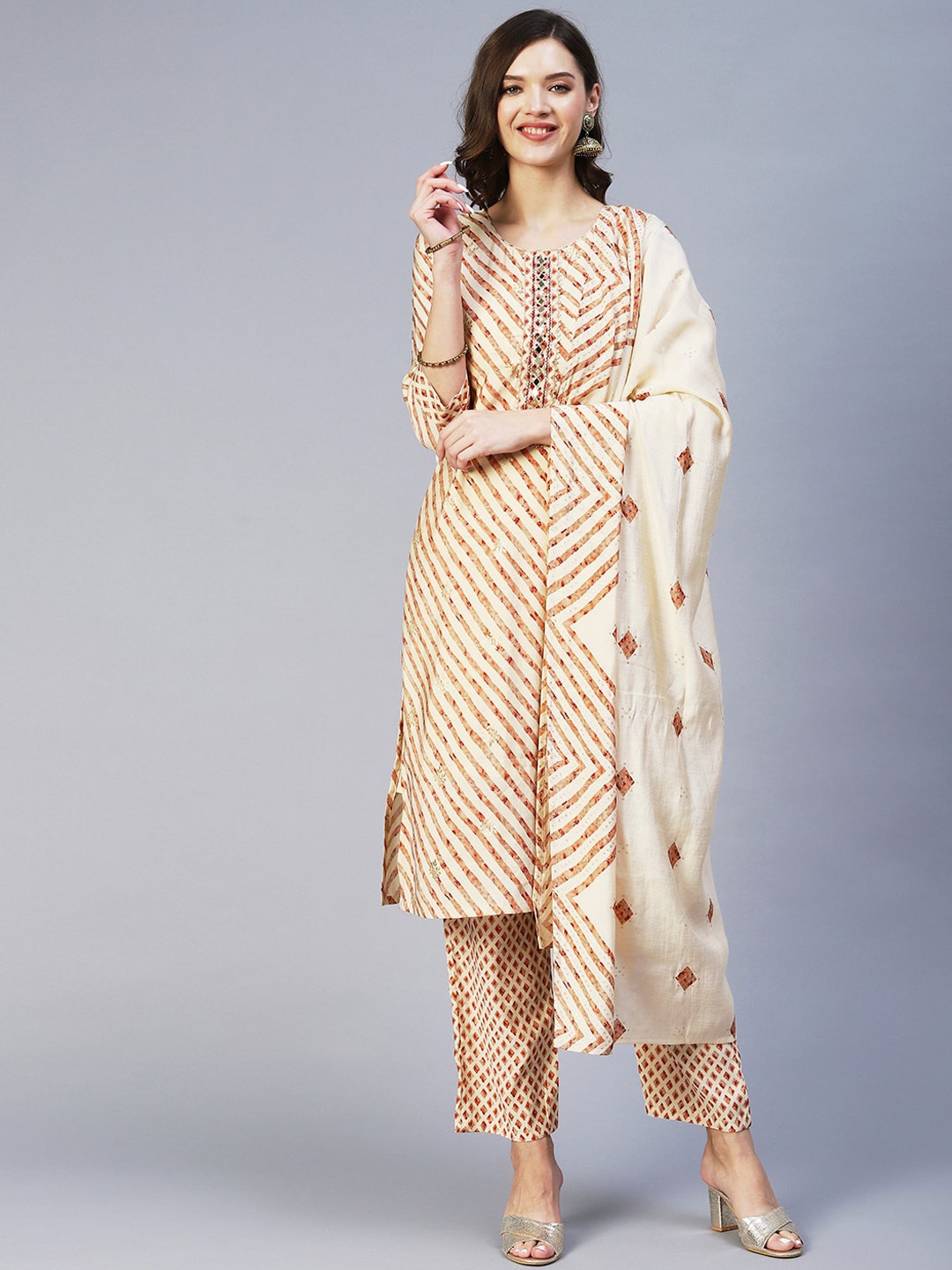 

FASHOR Leheriya Printed Mirror Work Kurta with Trousers & With Dupatta, Cream