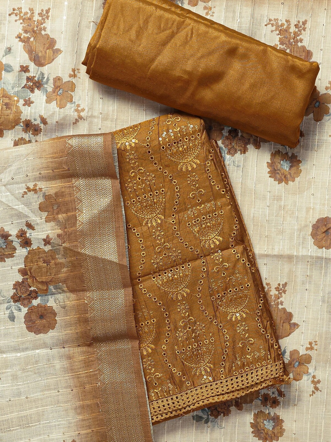

Kalamandir Mustard Unstitched Dress Material