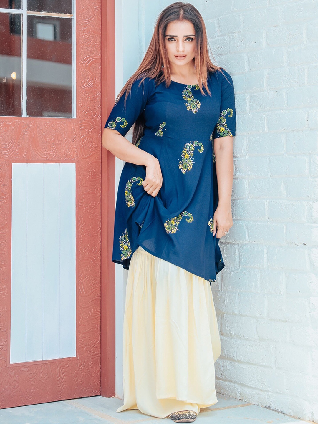 

Thread & Button Women Paisley Printed A-Line Kurti with Sharara, Navy blue