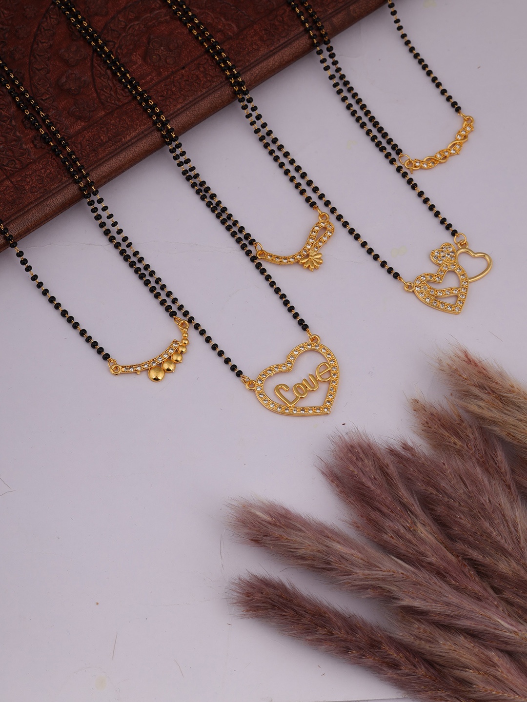 

Brado Jewellery Set of 5 Gold-Plated AD Studded & Beaded Mangalsutra
