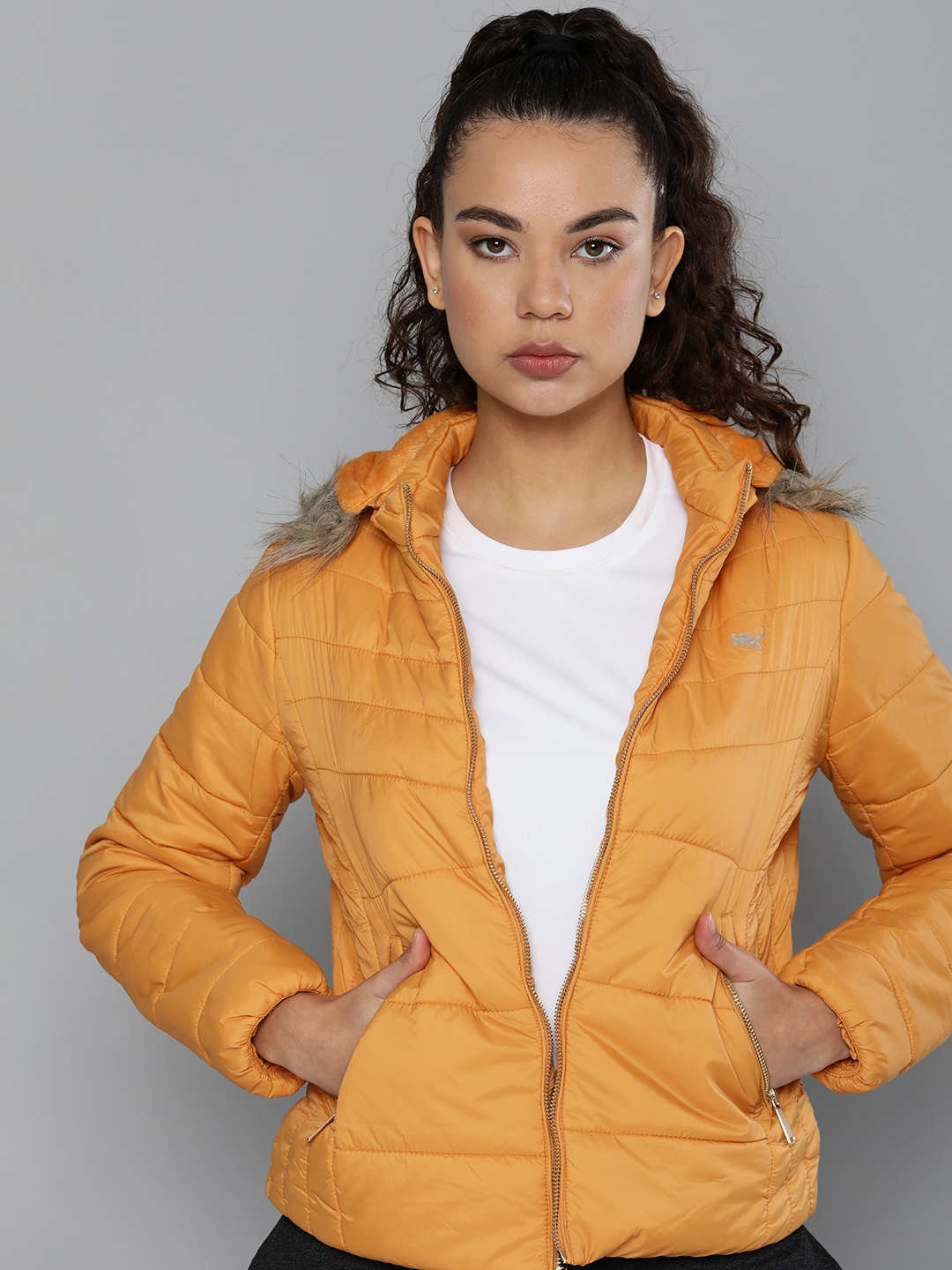 

HRX by Hrithik Roshan Women Lightweight Running Sporty Jacket, Mustard