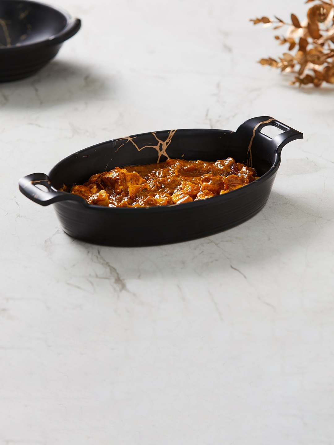 

Home Centre Silvano Black Printed Oval-Shaped Melamine Serving Kadhai