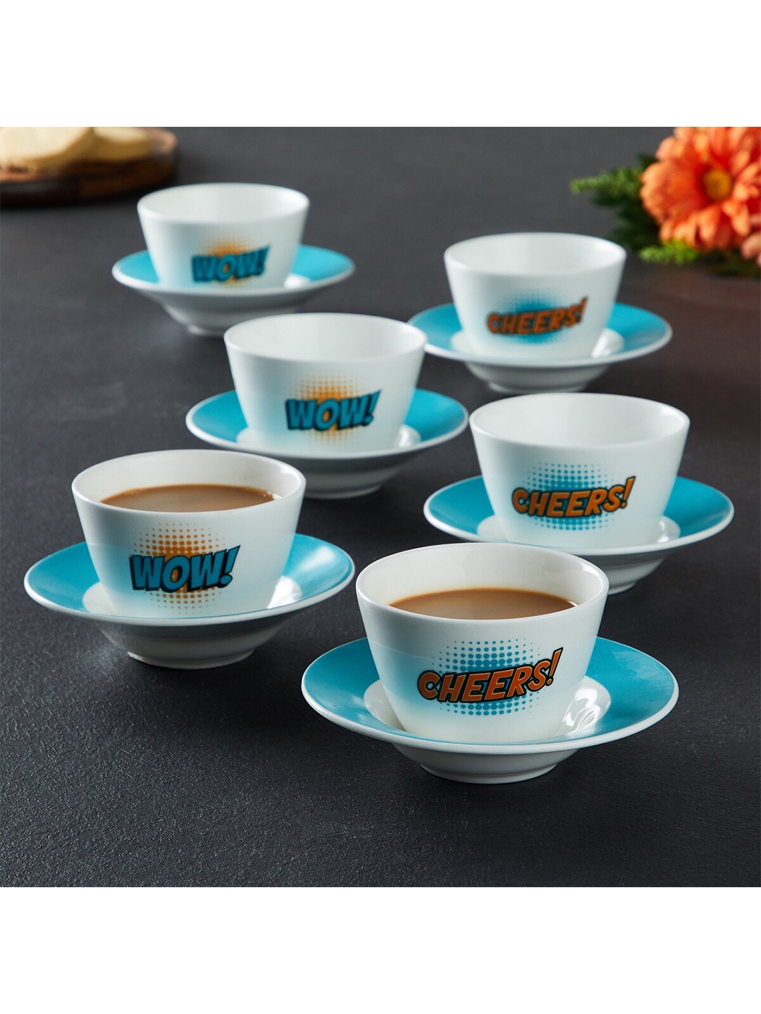 

Home Centre White & Blue Set 12 Printed Bone China Glossy Cups and Saucers Set 140 ml