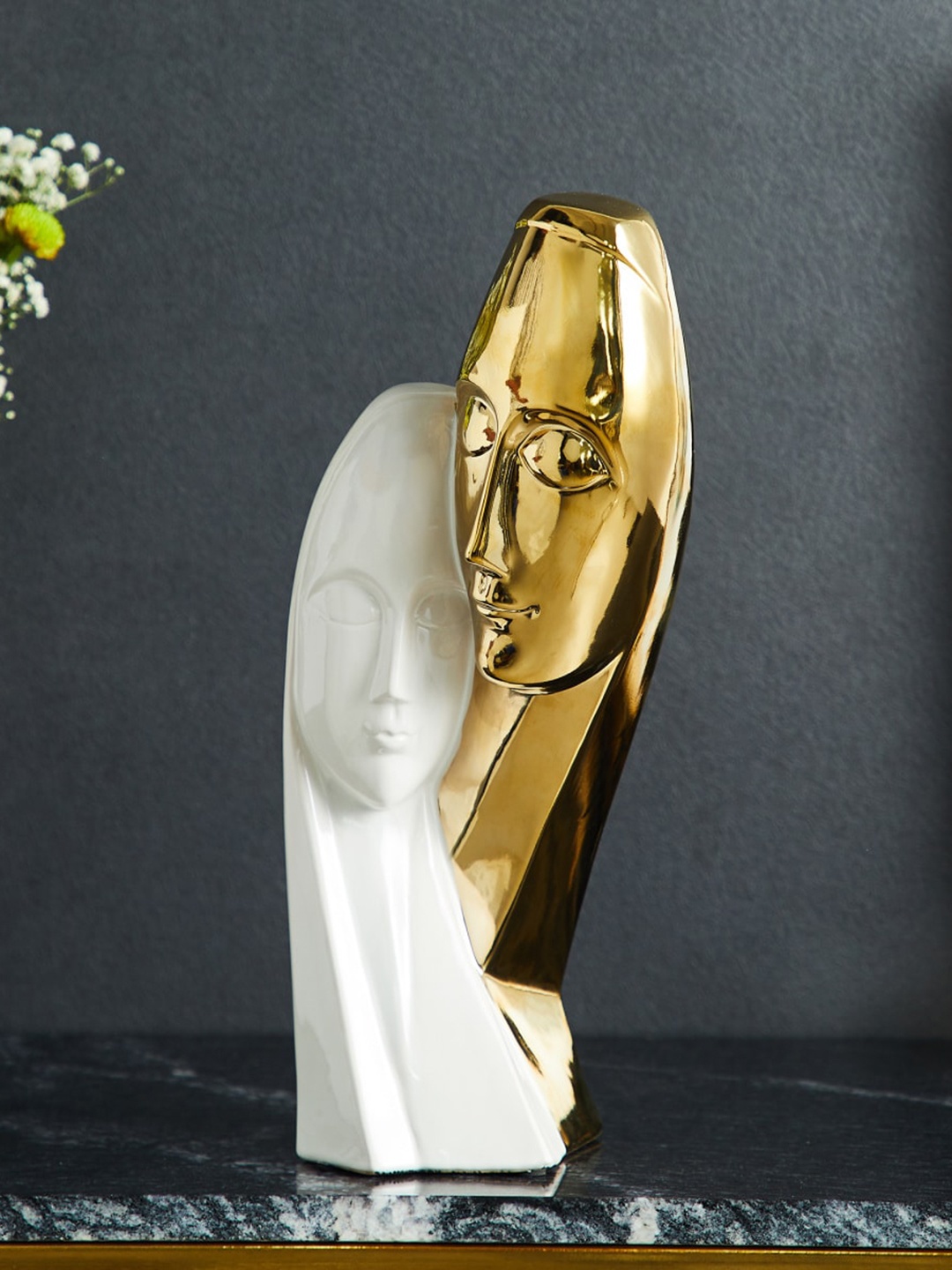 

Home Centre Brighton White & Gold-Toned Textured Ceramic Face Figurine Showpiece