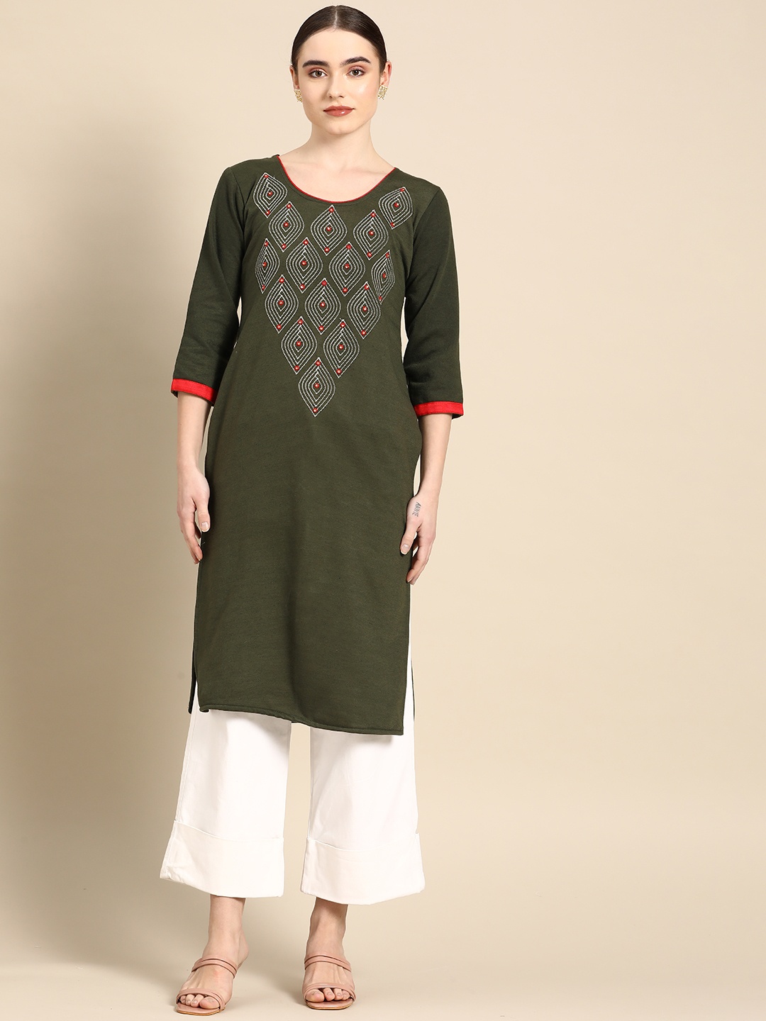 

Saadgi Women Green Woollen Ethnic Motifs Embroidered Mirror Work Kurta, Olive