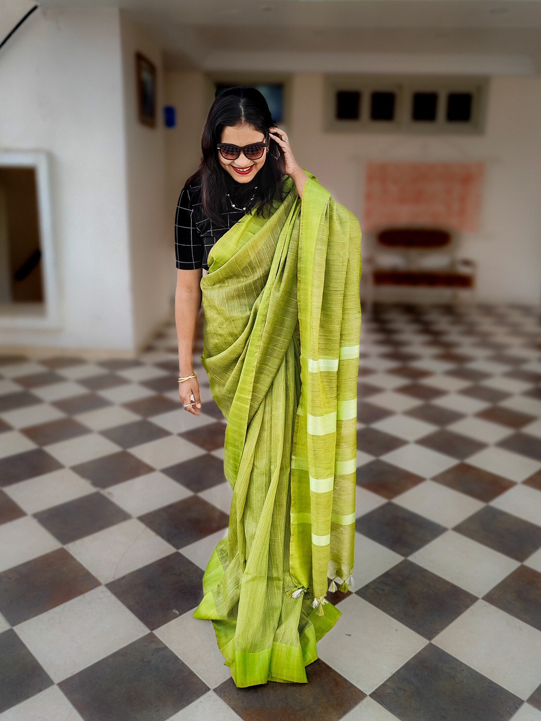 

Apaapi Threads of glory Green & White Striped Saree