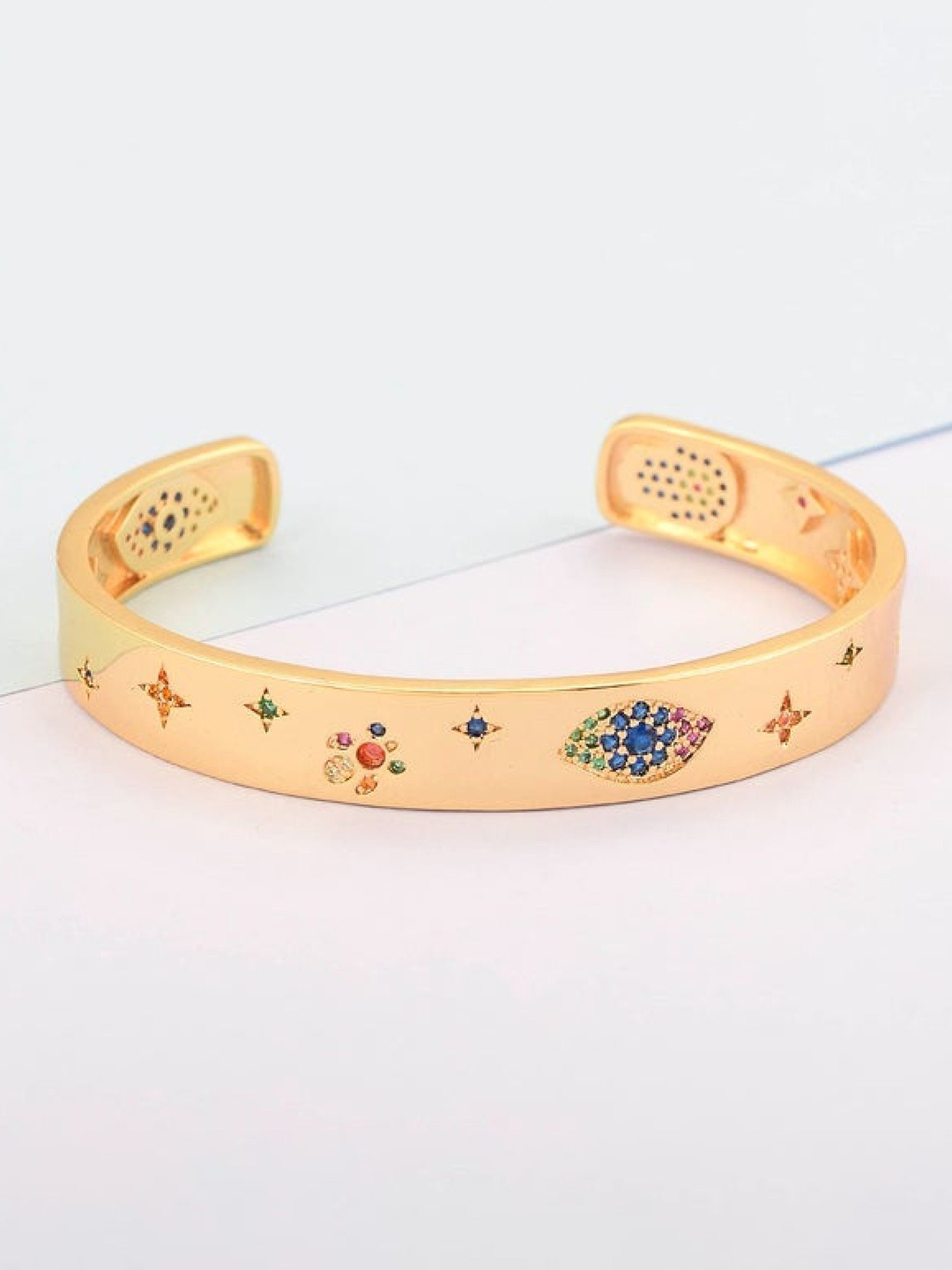 

ZIVOM Women Gold-Toned & Blue Crystals Antique Gold-Plated Cuff Bracelet