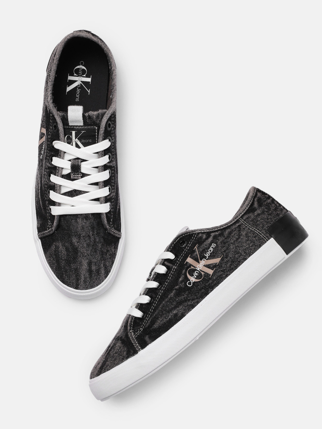 

Calvin Klein Jeans Men Solid Sneakers, Black