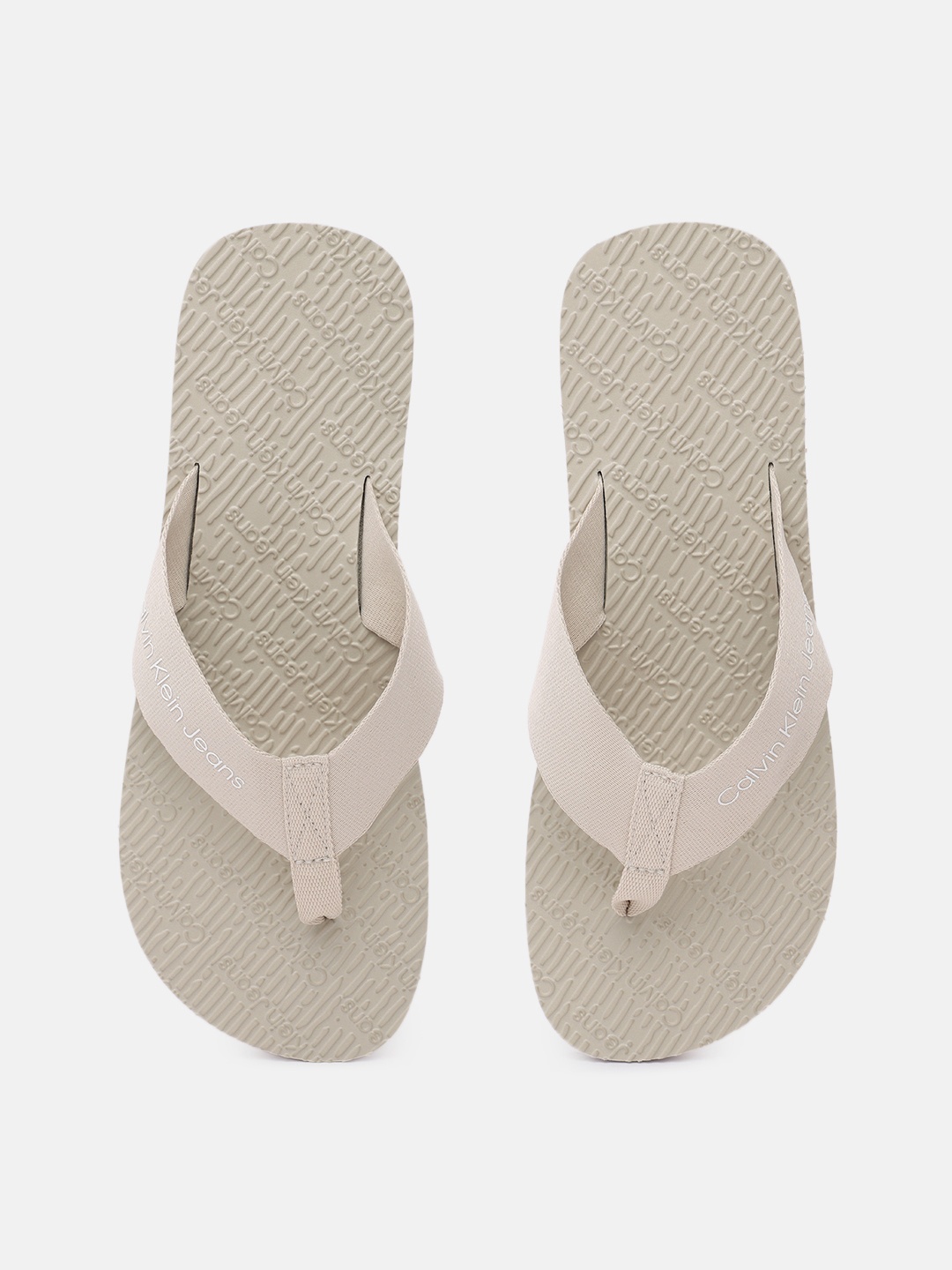 

Calvin Klein Jeans Men Brand Logo Print Thong Flip-Flops, Beige