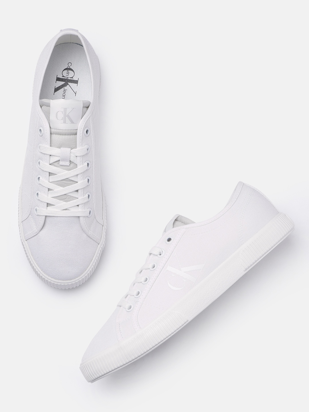 

Calvin Klein Jeans Men Solid Sneakers, White