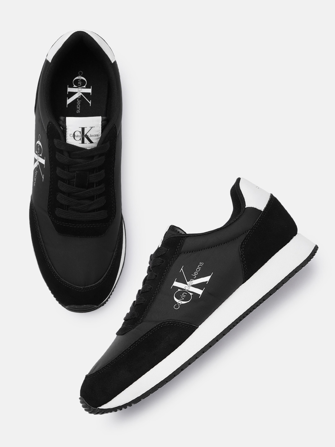 

Calvin Klein Jeans Men Leather Retro Sneakers, Black