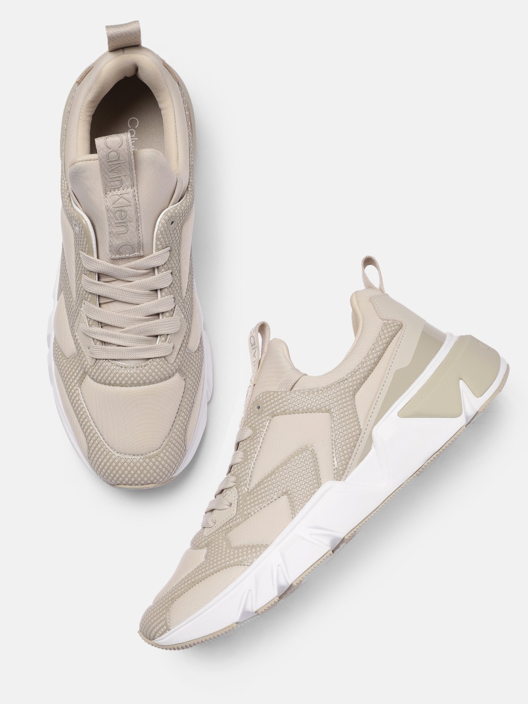 

Calvin Klein Jeans Men Solid Sneakers, Cream