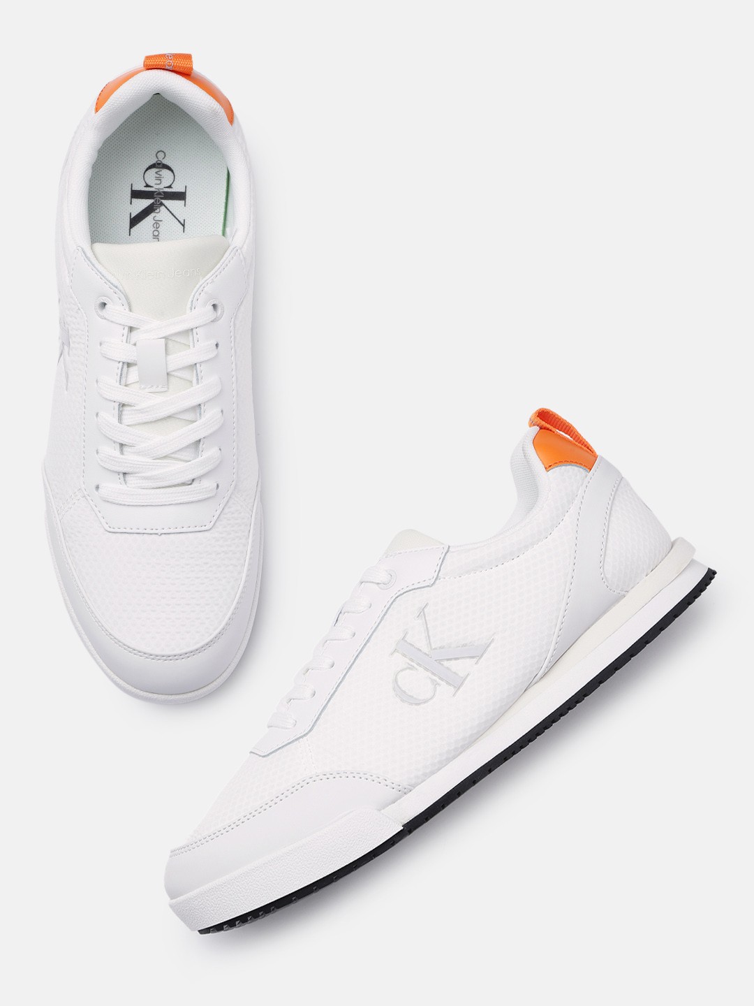 

Calvin Klein Jeans Men Solid Sneakers, White