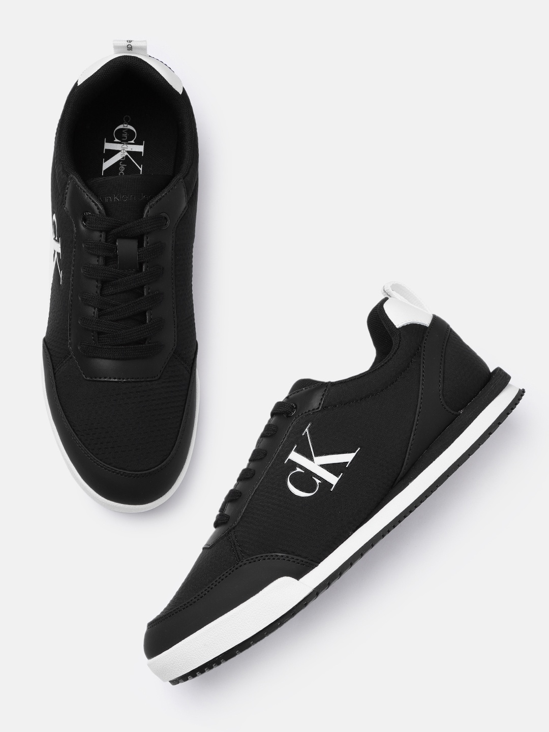 

Calvin Klein Jeans Men Solid Regular Sneakers With Minimal Brand Logo Print Detail, Black