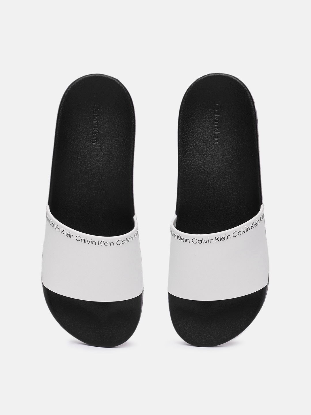 

Calvin Klein Jeans Men Solid Sliders With Minimal Brand Logo print Detail, White