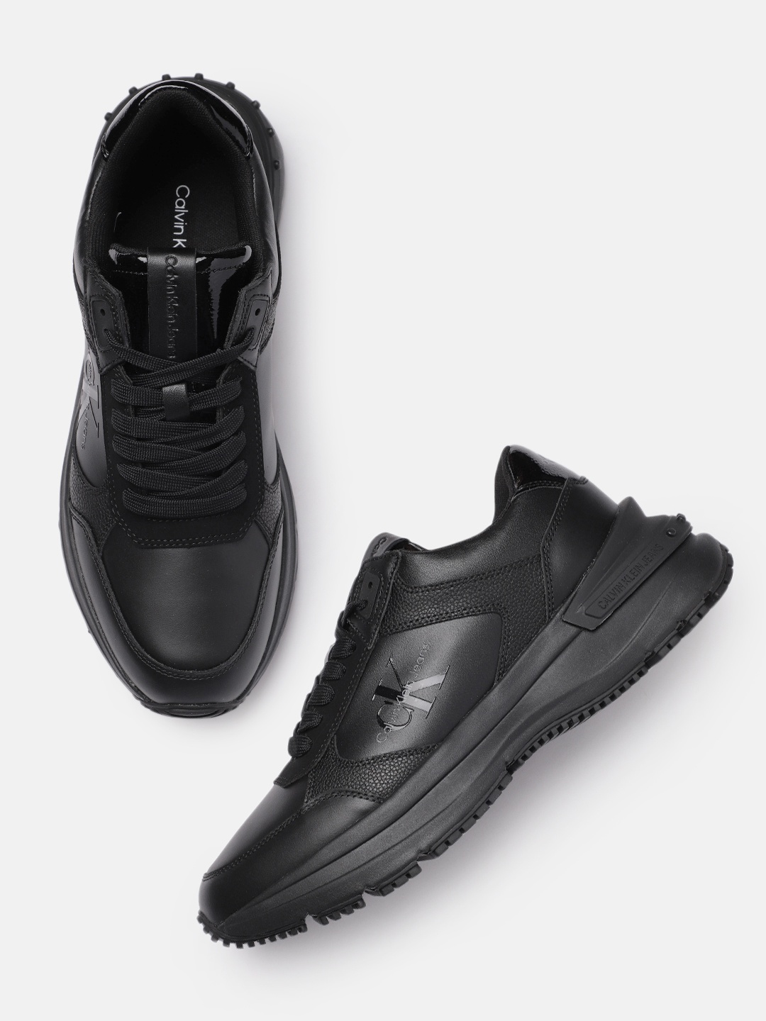

Calvin Klein Jeans Men Leather Sneakers, Black