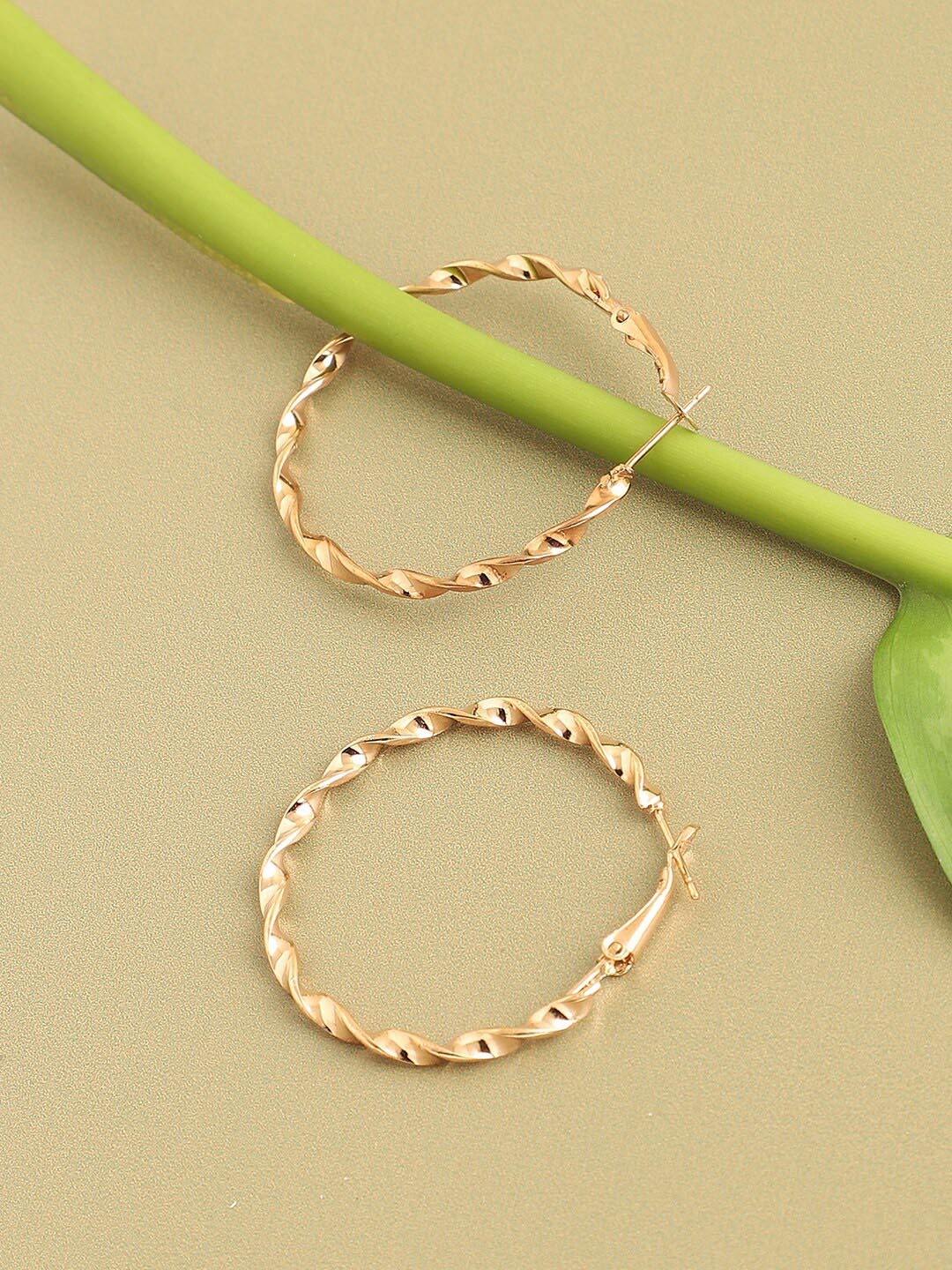 

SOHI Gold-Plated Contemporary Hoop Earrings