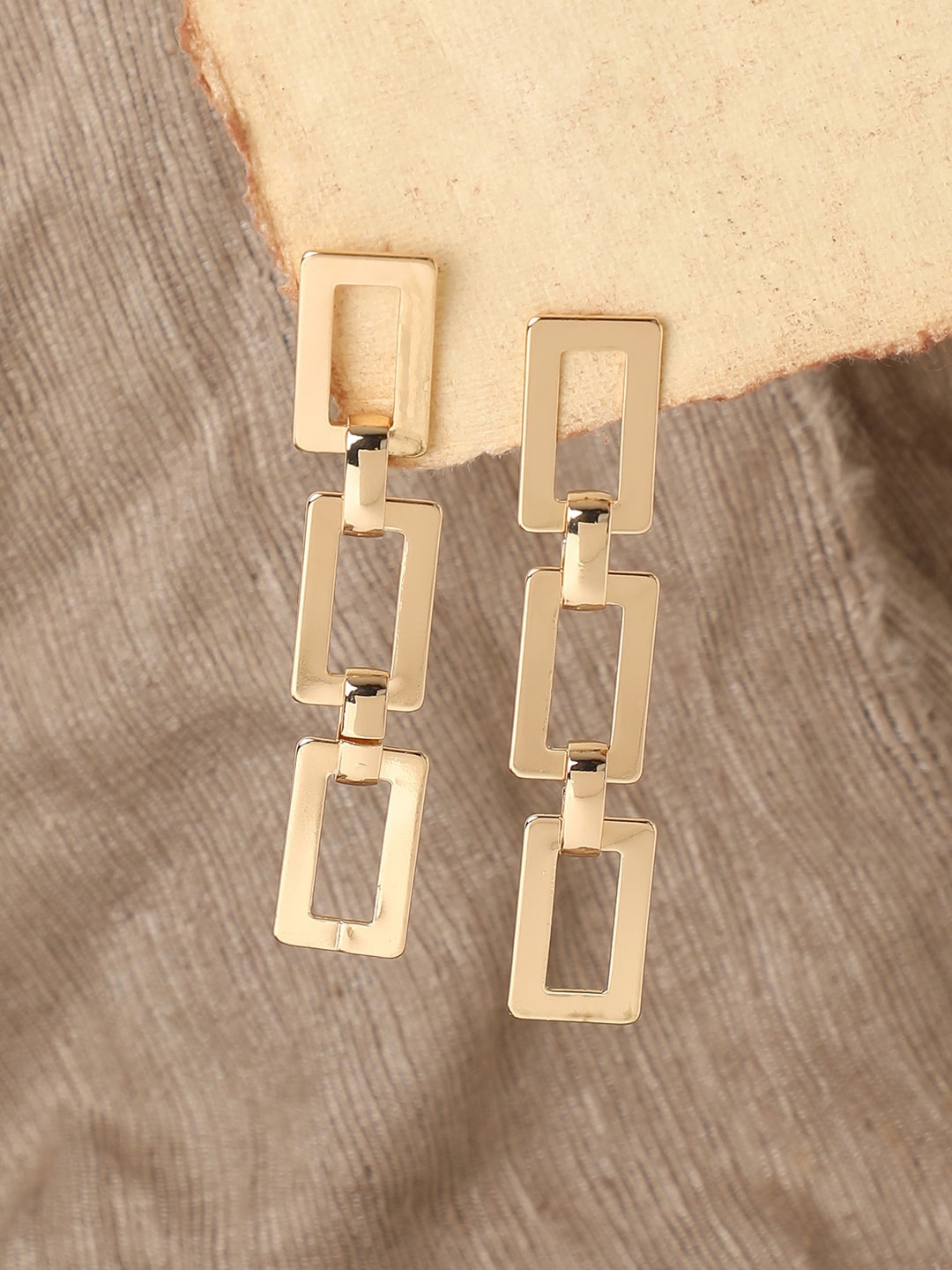 

SOHI Gold-Plated Contemporary Drop Earrings