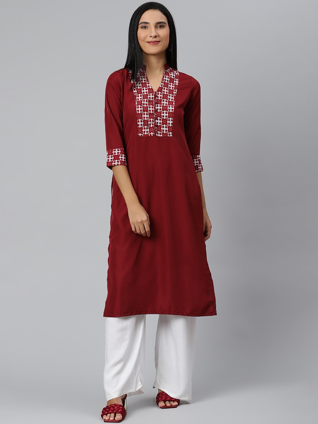 

Ives Women Maroon Yoke Design Mirror Work Crepe Kurta
